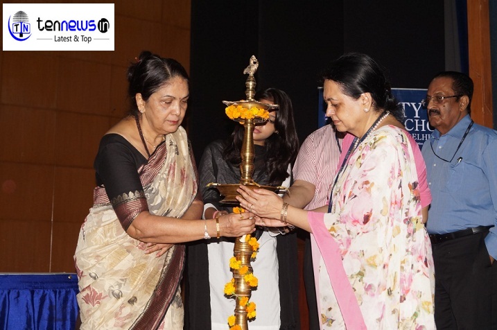 Former Justice Gyan Sudha Mishra lighting the lamp