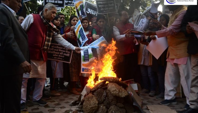 BJP's Vijay Goel burns AAP Manifesto ahead of Delhi Assembly Election