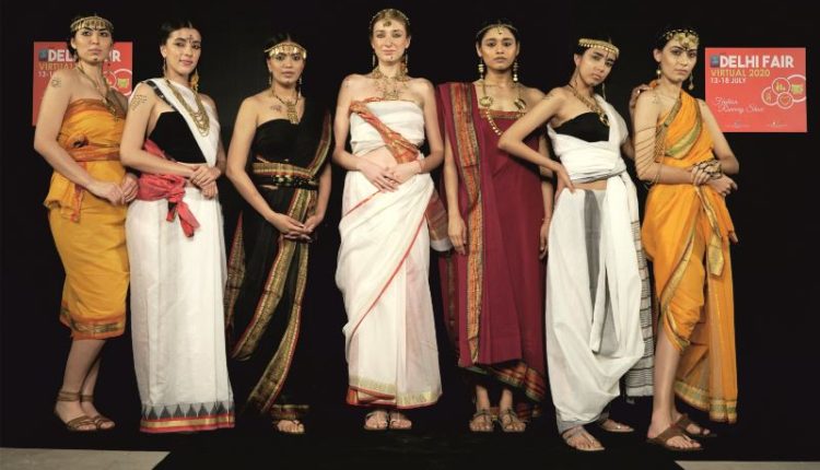 MODELS SHOWCASING DHOKRA CASTING TRIBAL JEWELLERY